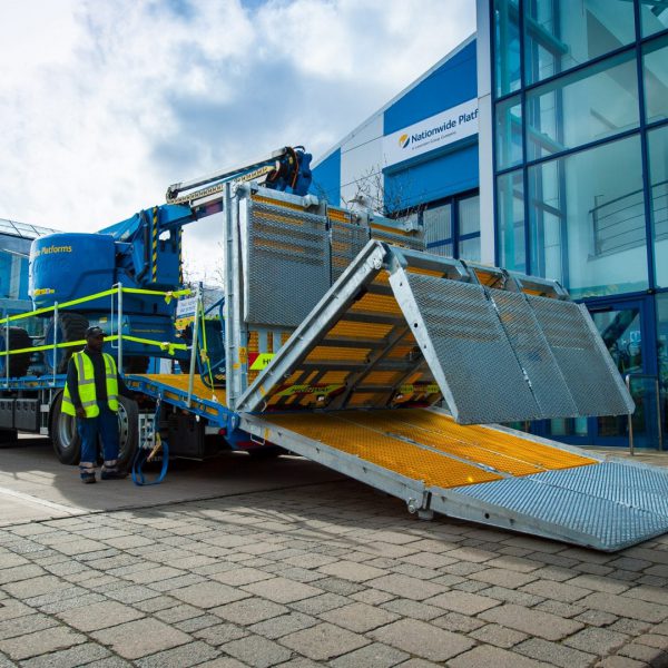 Sterling Nationwide Platforms double-flip beavertail truck in motion